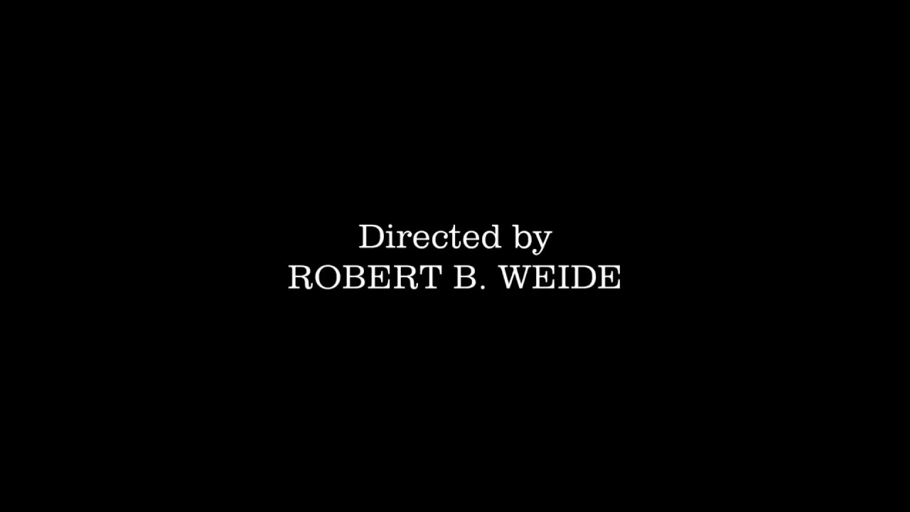Black screen with white serif text reading Directed by ROBERT B. WEIDE.
